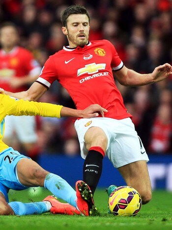  Michael Carrick - Michael Carrick says United are not Satisfaction & # XF8; height with third. - Photo: Nick Potts / AP 