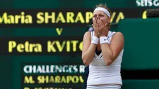 TENNIS-WIMBLEDON/ Petra Kvitova of the Czech Republic celebrates after defeating Maria Sharapova of Russia in their final match at the Wimbledon tennis championships in London (Foto: STEFAN WERMUTH/Reuters) TENNIS-WIMBLEDON/ Petra Kvitova of the Czech Republic celebrates after defeating Maria Sharapova of Russia in their final match at the Wimbledon tennis championships in London (Foto: STEFAN WERMUTH/Reuters)