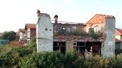Bygninger med skader etter krigen i Bosnia Bygninger med skader etter krigen i Bosnia