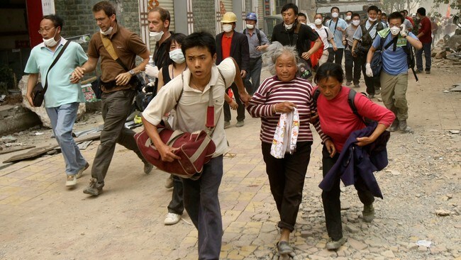 Kinesere på flukt (Foto: STRINGER SHANGHAI/REUTERS) Kinesere på flukt (Foto: STRINGER SHANGHAI/REUTERS)