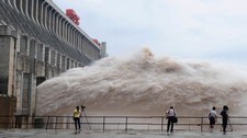 Oversvømmelse i Kina (Foto: Cheng Min/Ap)