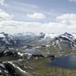 Sett fra Kyrkja mot vest. eirvassbu og Leirvatnet. Smørstabbrean og Storebjørn i bakgrunnen, og Hurrungane til venstre.