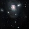 Spiralgalaksen NGC 4911 ligger 320 millioner lysår fra jorda. Her er den fotografert med en lukkertid på hele 28 timer.