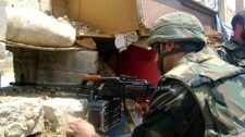 En soldat fra regjeringshæren i Syria i Qusayr (Afp)