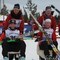 Martin Johnsrud Sundby, Andrew Musgrave og Ronny Fredrik Ansnes kjøres frem til pallen.