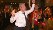 SOCCER-CHAMPIONS/ Bayern Munich coach Jupp Heynckes dances together with midfielder Bastian Schweinsteiger at the team's banquet in London