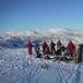 Familier på vinterferietur til Grieghytten, Hamlagrøvatnet bak.