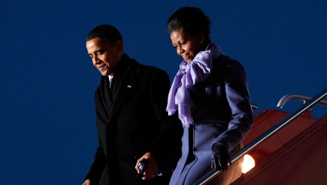 Barack og Michelle Obama ned trappen (Foto: Heiko Junge/Scanpix) Barack og Michelle Obama ned trappen (Foto: Heiko Junge/Scanpix)
