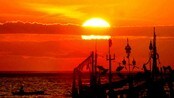 Solnedgang på Bali (Foto: SONNY TUMBELAKA/AFP)