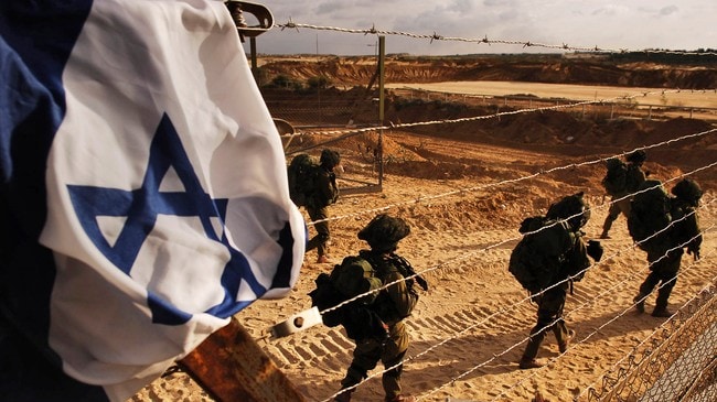 Israelske soldater på vei mot Gaza (Foto: Neil Cohen/Scanpix/AP) Israelske soldater på vei mot Gaza (Foto: Neil Cohen/Scanpix/AP)