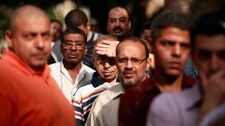 Egyptarar ventar på å få stemme (Foto: SUHAIB SALEM/Reuters)