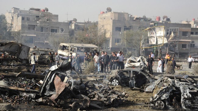 Damaskus etter bombeangrep (Foto: SANA/Reuters) Damaskus etter bombeangrep (Foto: SANA/Reuters)