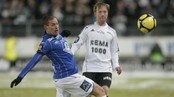 Moldes Thomas Holm mot RBKs Fredrik Winsnes under eliteseriekampen mellom Molde og Rosenborg.