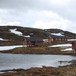 Hyttetunet. Fra venstre: Gammelhytta, nyhytta som ble innviet i 2010, uthuset