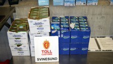 Smuglet smør og kjøtt (Foto: Tollvesenet) Smuglet smør og kjøtt (Foto: Tollvesenet)
