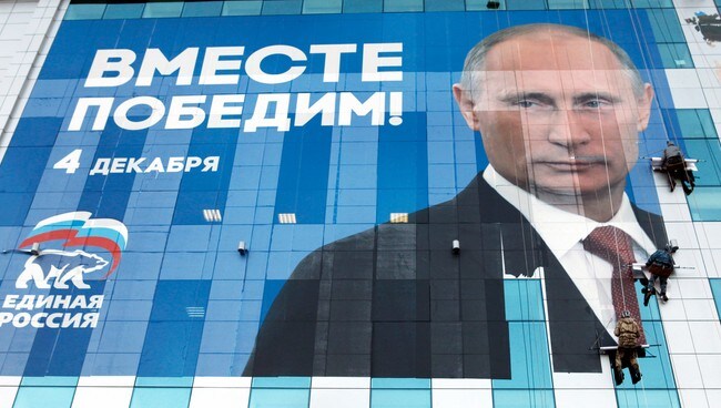 Putin-plakat (Foto: EDUARD KORNIYENKO/Reuters) Putin-plakat (Foto: EDUARD KORNIYENKO/Reuters)