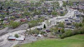 I Kvam i Gudbrandsdalen har flomvann fra Storå har gjort stor skade (Foto: Håkon Mosvold Larsen/NTB Scanpix) I Kvam i Gudbrandsdalen har flomvann fra Storå har gjort stor skade (Foto: Håkon Mosvold Larsen/NTB Scanpix)