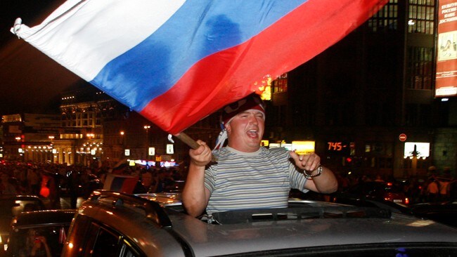 Russiske fans (Foto: MIKHAIL METZEL/AP) Russiske fans (Foto: MIKHAIL METZEL/AP)