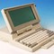 Japanske Toshiba var den første som kom med integrert flatsjerm. Dette var i 1985