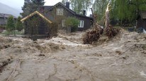 Flommer over på Kvam (Foto: Geir Randby/NRK)