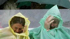 Regn (Foto: KIRSTY WIGGLESWORTH/AP) Regn (Foto: KIRSTY WIGGLESWORTH/AP)