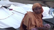 Nekter å forlate teltene sine - Myanmarske myndigheter vil tvangsevakuere kvinner og barn som nekter å evakuere i påvente av en syklon som treffer landet torsdag.