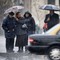 STORM: Befolkningen i Chile  gjemmer seg under paraplyer under en storm i Santiago. 