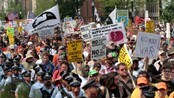 NATO-SUMMIT/PROTESTS Demonstrators march down Michigan Avenue during an anti-NATO protest march in Chicago
