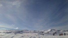 Toppen med varden i bakgrunnen.