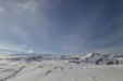 Toppen med varden i bakgrunnen.