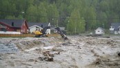 Flomvann i Kvam - Vannet flommer gjennom Kvam sentrum.