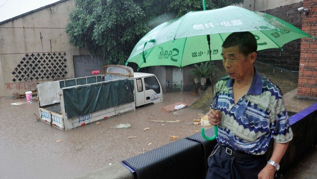 Kraftig regn i Kina (Foto: SHI TOU/Reuters) Kraftig regn i Kina (Foto: SHI TOU/Reuters)
