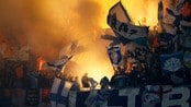 SOCCER-FRANCE/ Supporters of Olympique Marseille attend their French Ligue 1 soccer match against Olympique Lyon at the Gerland stadium in Lyon