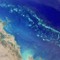 Verdas største korallrevsystem, Great Barrier Reef, sett frå NASA-satelitten MISR.