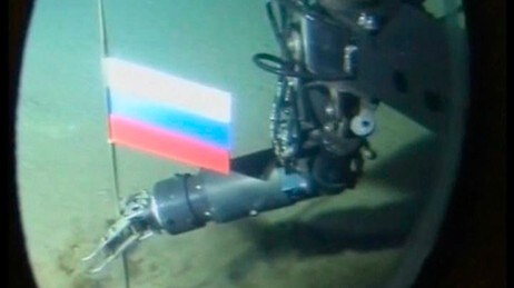 Russisk flagg plantes på Nordpolen (Foto: REUTERS TV/REUTERS) Russisk flagg plantes på Nordpolen (Foto: REUTERS TV/REUTERS)