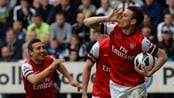 SOCCER-ENGLAND/ Arsenal's Koscielny celebrates his goal with Cazorla during their English Premier League soccer match against Newcastle United in Newcastle