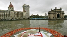 Livets ring i Mumbai (Foto: Gautam Singh/AP)