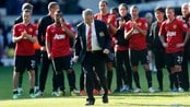 SOCCER-ENGLAND/ Manchester United manager Ferguson walks towards the fans to accept their applause after their English Premier League soccer match against Albion at The Hawthorns in West Bromwich