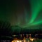 Nordlys mellom fjelltoppene Tenna og Målegga nordvest for Lillebø i Dalsbygda i Volda 
