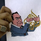 Karikatur av Mubarak mot Al-Jazeera (Foto: JOSEPH EID/Afp)