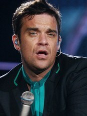 Robbie Williams (Foto: MATE NANDORFI/AP) Robbie Williams (Foto: MATE NANDORFI/AP)