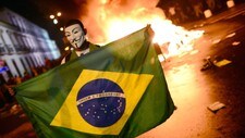 Demonstrant i Rio de Janeiro, Brasil (Foto: CHRISTOPHE SIMON/Afp) Demonstrant i Rio de Janeiro, Brasil (Foto: CHRISTOPHE SIMON/Afp)