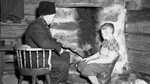 Sydpolfarer Olav Bjaaland tente ilden i Sondre Nordheims stue i Morgedal før OL i 1952.