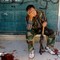 En soldat i Free Syrian Army reagerer etter at hans venn ble skutt under kamper med regimets militære i Aleppo lørdag.