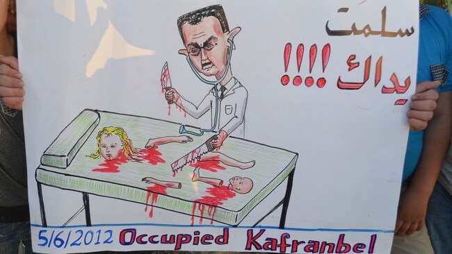 Plakat mot Bashar Al-Assad (Foto: HANDOUT/Reuters)