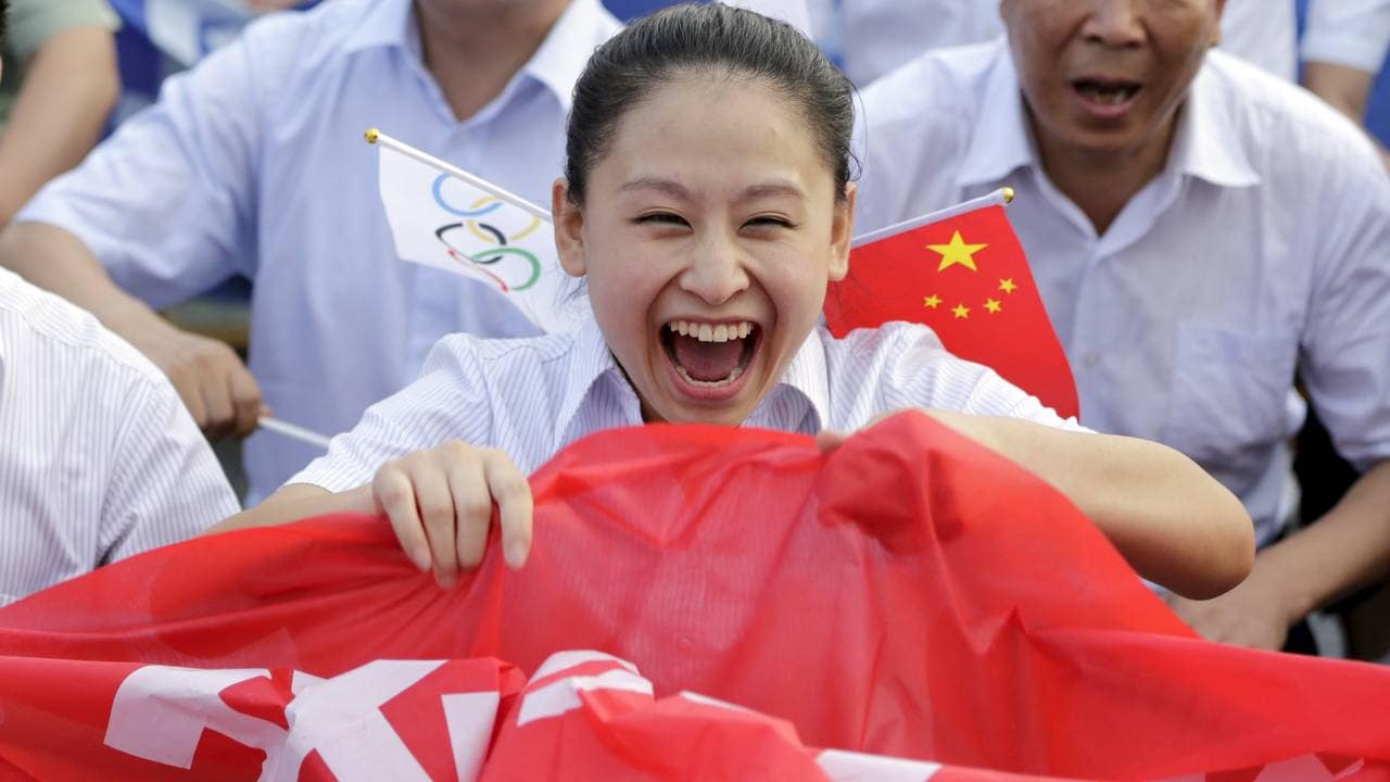 PLANNLEGGER LANSERING: Folk feiret da Beijing ble valgt til å holde vinter-OL i 2022.