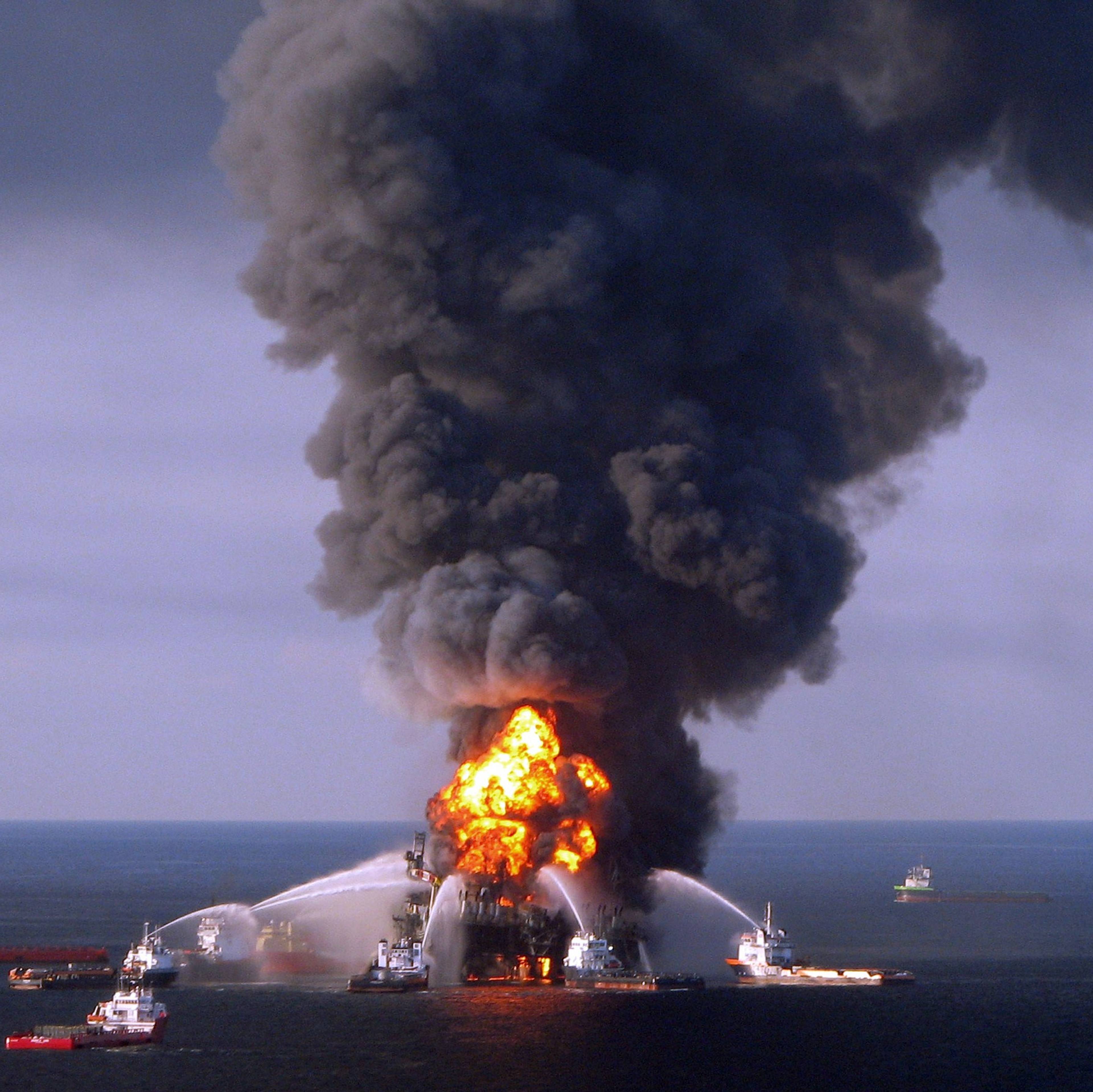 (FILES) A file photo taken on on April 21, 2010 shows a US Coast Guard handout image of fire boat response crews as they battle the blazing remnants of the BP operated off shore oil rig, Deepwater Horizon, in the Gulf of Mexico.   BP said on February 7, 2012 that net profits hit 23.9 billion US dollars in 2011 after a loss the previous year when the British energy giant was ravaged by US Gulf of Mexico oil spill disaster. RESTRICTED TO EDITORIAL USE - MANDATORY CREDIT  " AFP PHOTO / US COAST GUARD "  -  NO MARKETING NO ADVERTISING CAMPAIGNS   -   DISTRIBUTED AS A SERVICE TO CLIENTS