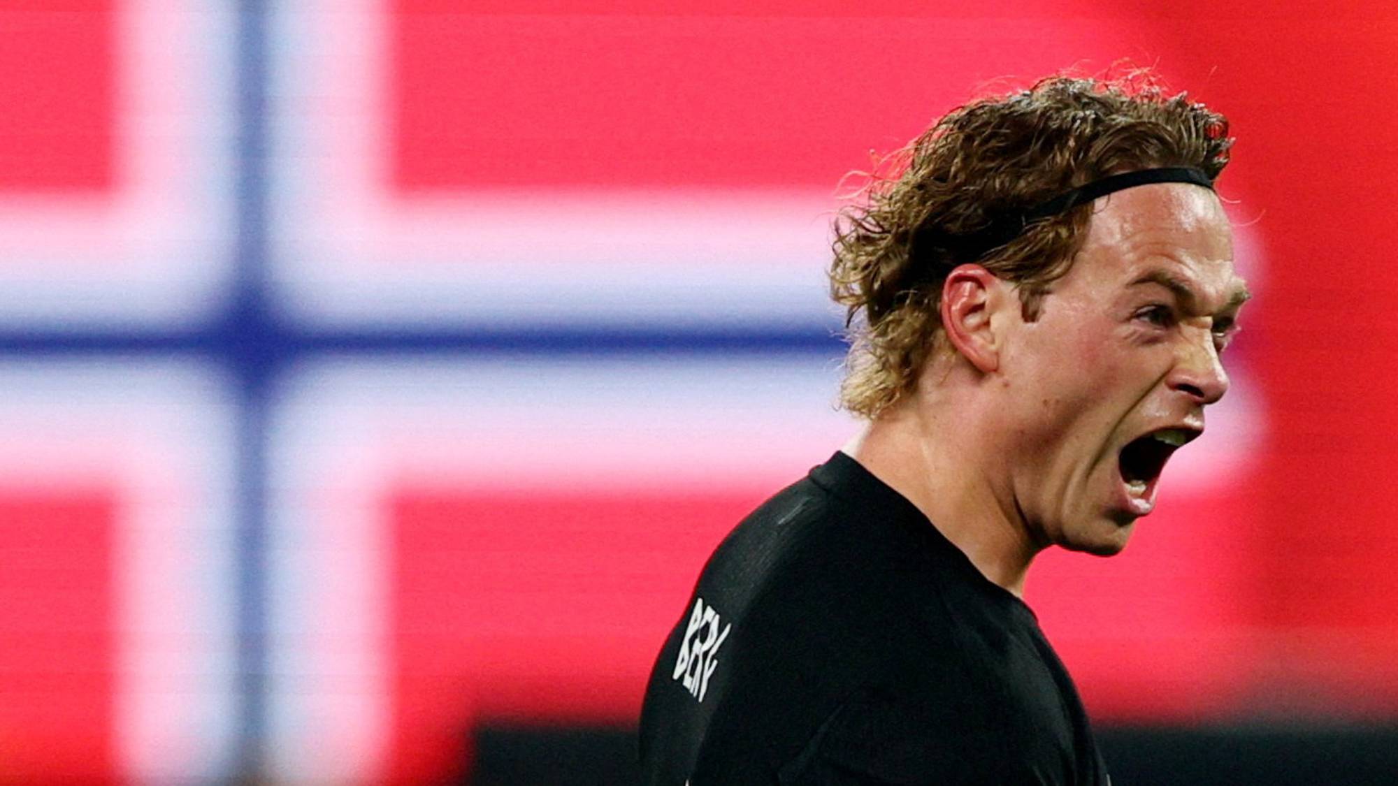 Patrick Berg foran norsk flagg