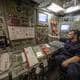 AFP Leading Engineering Technician Chris Randall in the control room onboard Vanguard-class submarine HMS Vigilant, one of the UK's four nuclear warhead-carrying submarines at HM Naval Base Clyde, Faslane, west of Glasgow, Scotland on April 29, 2019. - A tour of the submarine was arranged to mark fifty years of the continuous, at sea nuclear deterrent