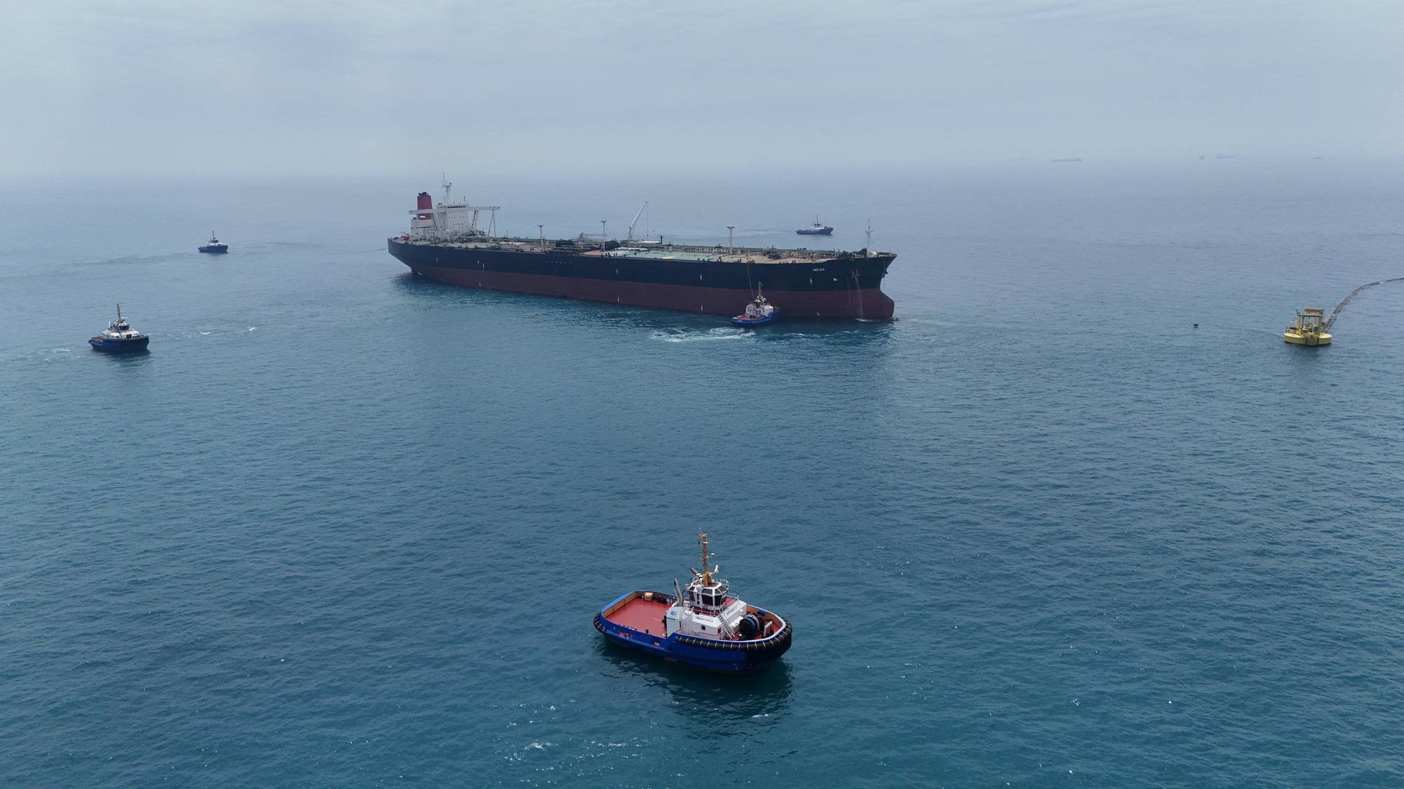 FILE PHOTO: Drone view of oil tanker HELGA berthed at one of Iraq's southern offshore oil terminals near Basra as it prepares to load crude oil, becoming the second vessel to arrive since the closure of the Strait of Hormuz, April 24, 2026. REUTERS/Mohammed Aty/File Photo